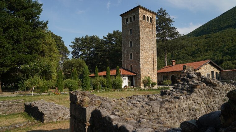 Tower of the Patriarchate of Peć (Peja, Kosovo); in the foreground remains of medieval monastic buildings