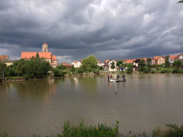 Untersuchungen im Hohenrother See. Ziehen von Bohrkernen durch Geographen der Universitäten Jena und Greifswald