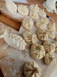Forms of Khinkali: round, twisted dumplings or "fish"
