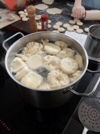 Upside down into boiling water for 10 minutes max.