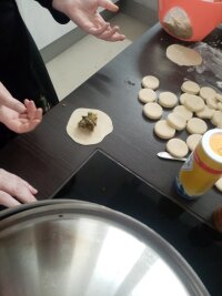 Filling the dough pieces. A level tablespoon is enough