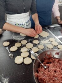 Twisting in the dumplings is easier for trained, Geogian hands