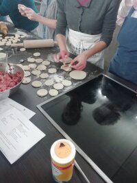 The twisting of the dumplings requires some dexterity