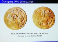 For a start of the Arabic-Islamic Numismatic Development Byzantine coins with Christian symbols were drawn on